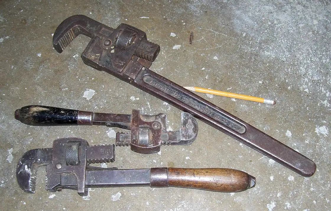 A pipe wrench used for plumbing work