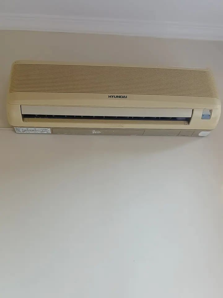A wall-mounted ductless mini-split air conditioner